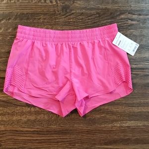 ATHLETA hot pink large hustle 3" shorts
